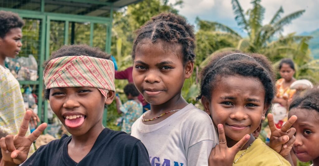 A group of smiling children posing outdoors in Floridablanca, Central Luzon, Philippines.